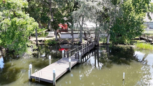 view of dock with a water view