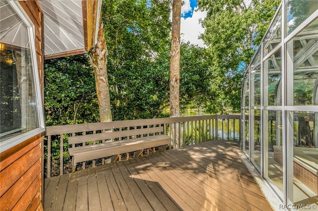 deck featuring a water view