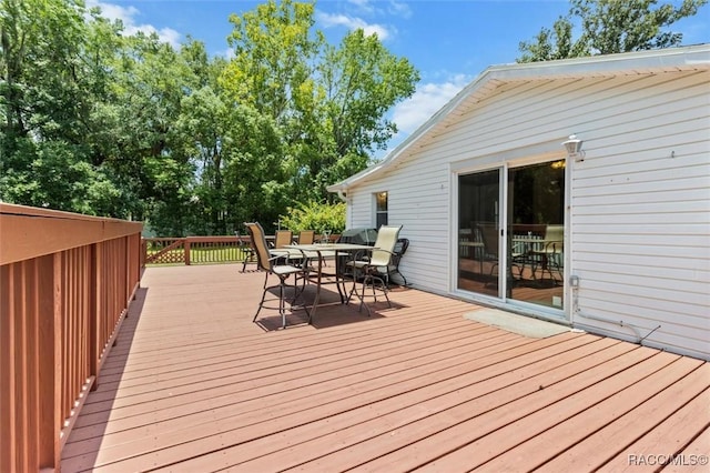 218 N Osceola Ave, Inverness, FL 34450 - wooden terrace featuring outdoor dining space