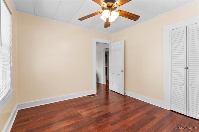 218 N Osceola Ave, Inverness, FL 34450 - unfurnished bedroom with wood finished floors, a closet, and ceiling fan