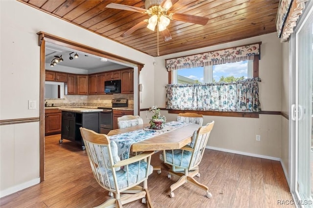 218 N Osceola Ave, Inverness, FL 34450 - dining space with light wood finished floors, wooden ceiling, and ceiling fan