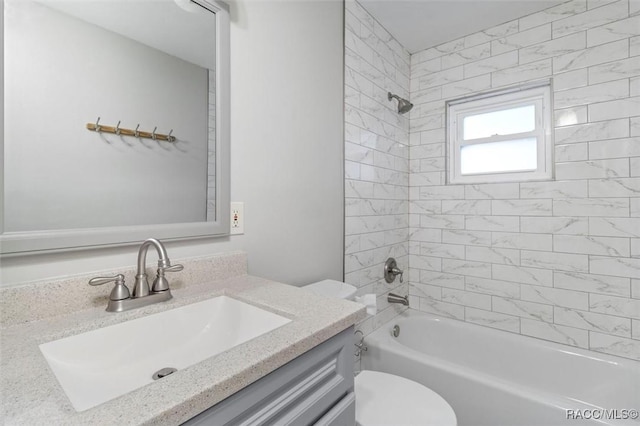 full bathroom with shower / bathtub combination, vanity, and toilet