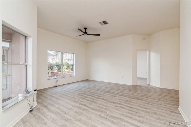 unfurnished room featuring ceiling fan and light hardwood / wood-style floors