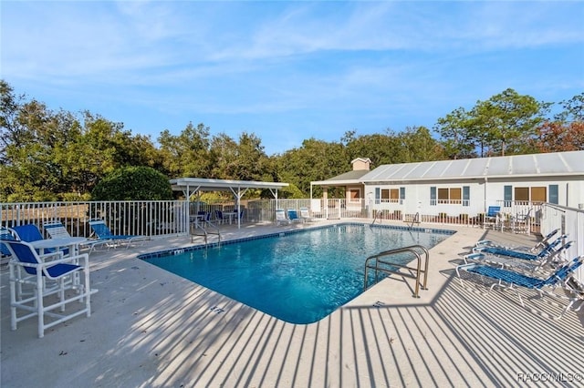 view of pool featuring a patio area