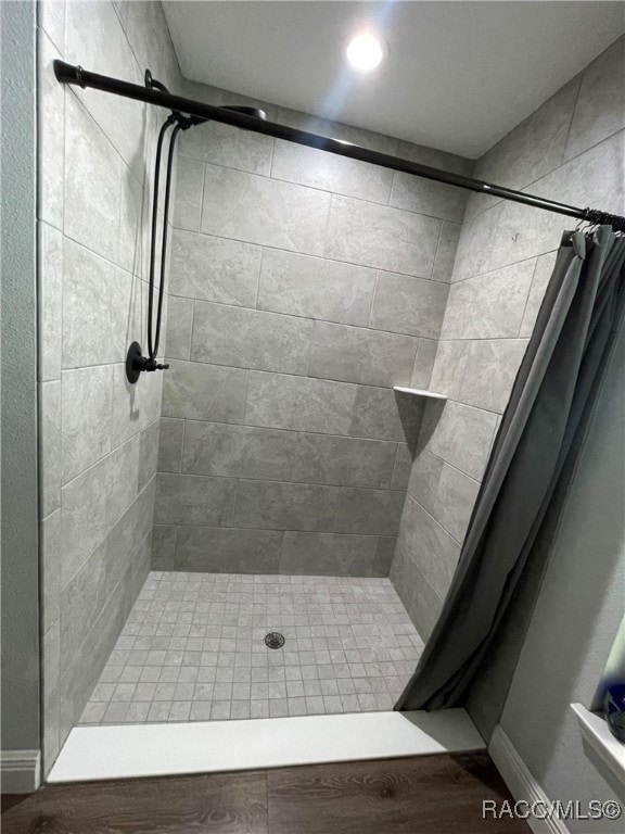 bathroom featuring curtained shower