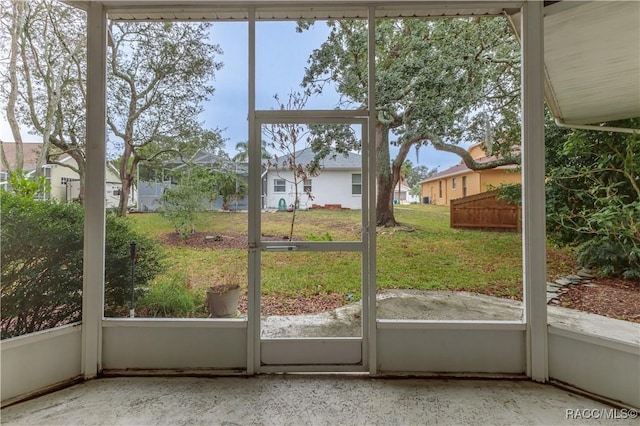 unfurnished sunroom with plenty of natural light