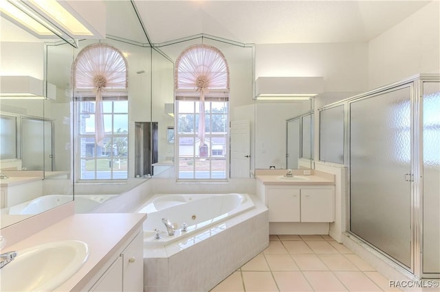 bathroom with vanity, tile patterned flooring, and shower with separate bathtub