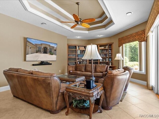 2622 N Carnoustie Loop, Lecanto, FL 34461 - living area featuring a tray ceiling, a ceiling fan, light tile patterned floors, baseboards, and recessed lighting