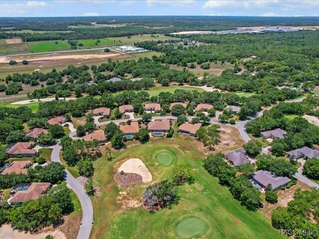 2622 N Carnoustie Loop, Lecanto, FL 34461 - aerial view of property and surrounding area with a local golf course and nearby suburban area