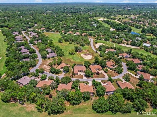 2622 N Carnoustie Loop, Lecanto, FL 34461 - aerial perspective of suburban area featuring a golf club and a large body of water