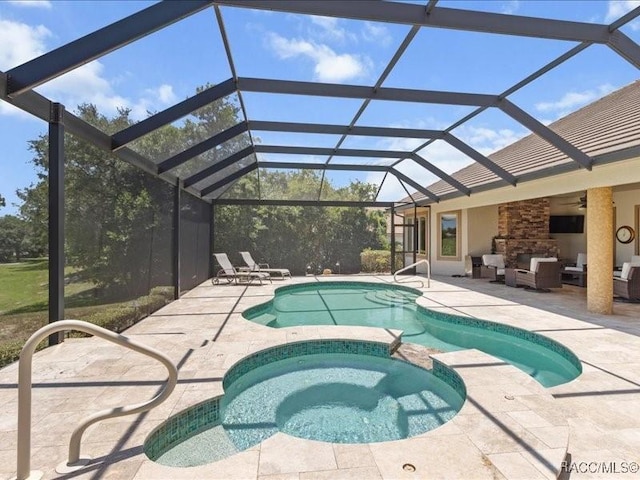 2622 N Carnoustie Loop, Lecanto, FL 34461 - view of pool with an outdoor hangout area, a patio area, a pool with connected hot tub, and glass enclosure