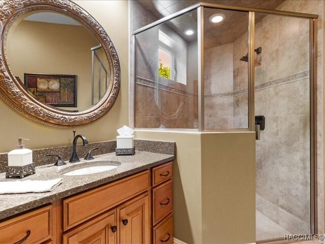 2622 N Carnoustie Loop, Lecanto, FL 34461 - full bath featuring vanity and a stall shower
