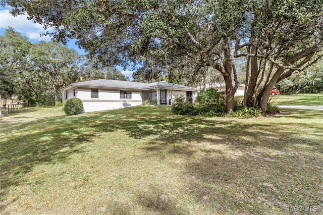 view of front of house with a front yard