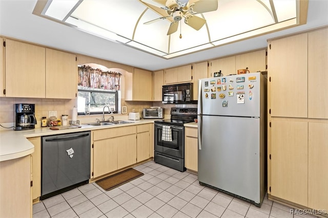 kitchen with light brown cabinets, sink, and appliances with stainless steel finishes