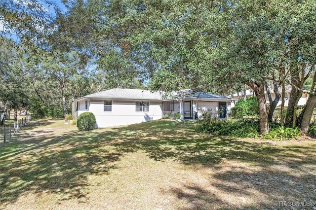 view of front of home featuring a front lawn