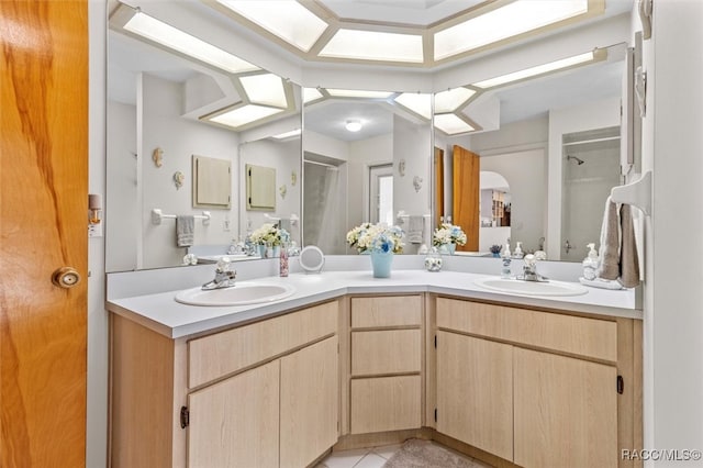 bathroom featuring vanity and walk in shower