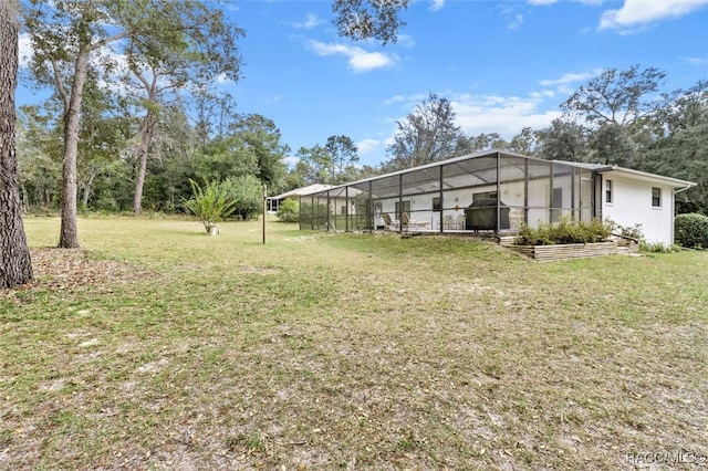 view of yard featuring a lanai