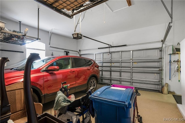 garage featuring a garage door opener