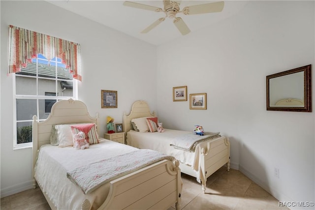 bedroom with light tile patterned floors and ceiling fan