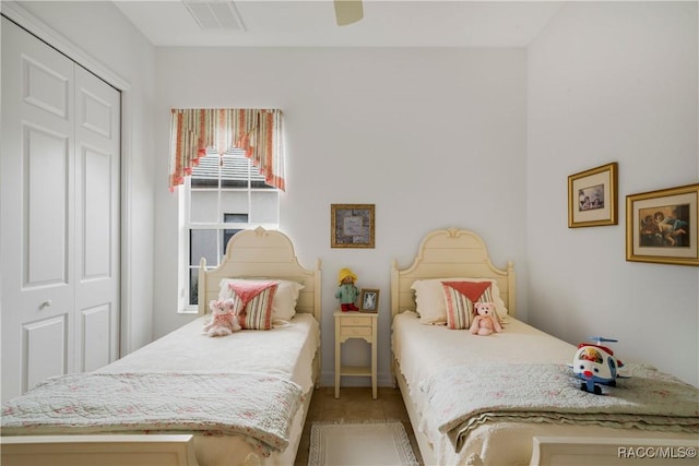 bedroom featuring a closet and ceiling fan