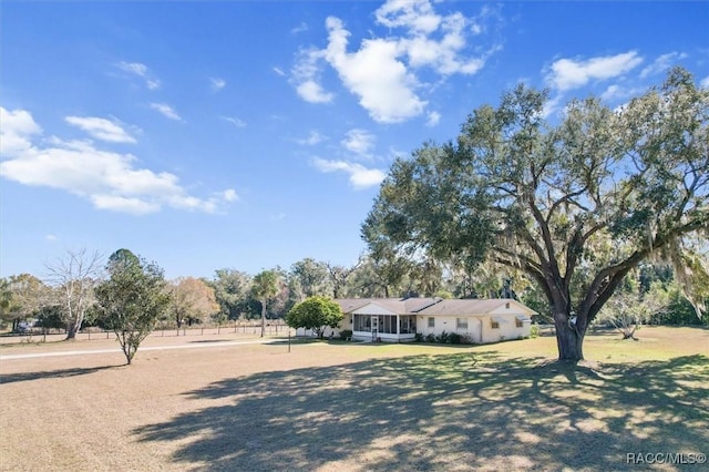 exterior space with a front lawn