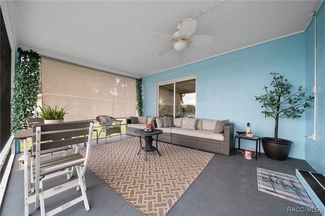 view of patio featuring an outdoor living space and ceiling fan