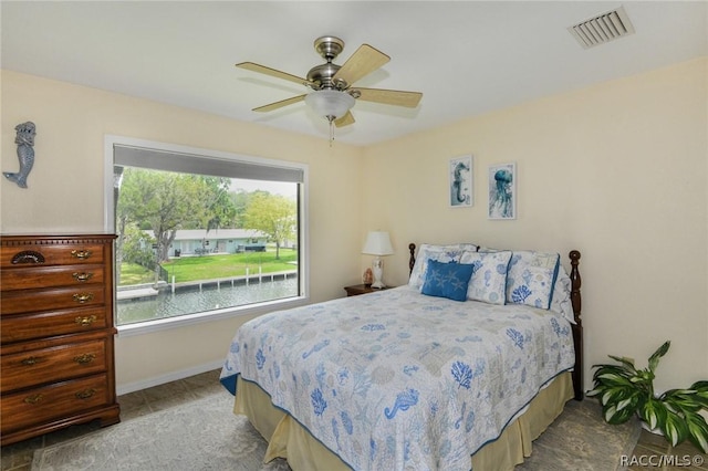 bedroom featuring ceiling fan