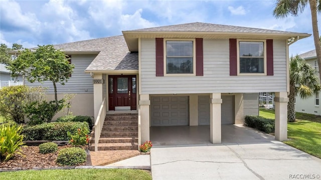 view of front of property with a garage