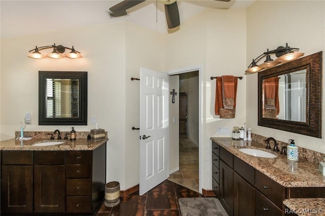 bathroom featuring ceiling fan and vanity