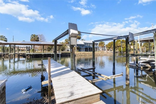 view of dock with a water view