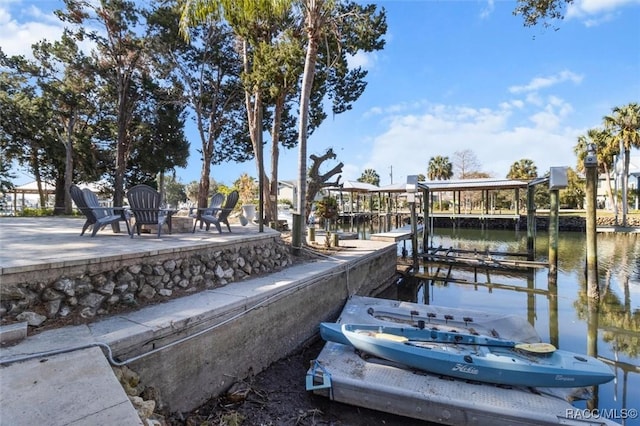 dock area featuring a water view