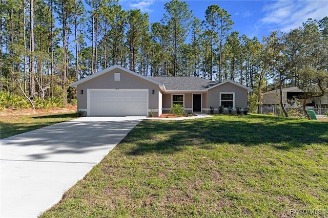 single story home with a garage and a front lawn