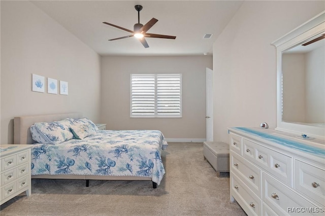 bedroom with light colored carpet and ceiling fan