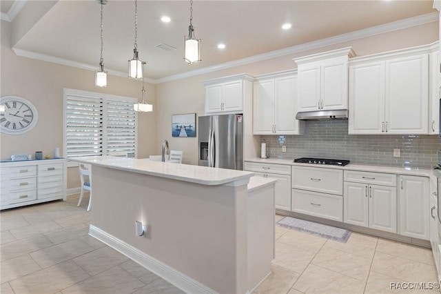 kitchen with black gas stovetop, white cabinets, hanging light fixtures, a kitchen island with sink, and stainless steel refrigerator with ice dispenser