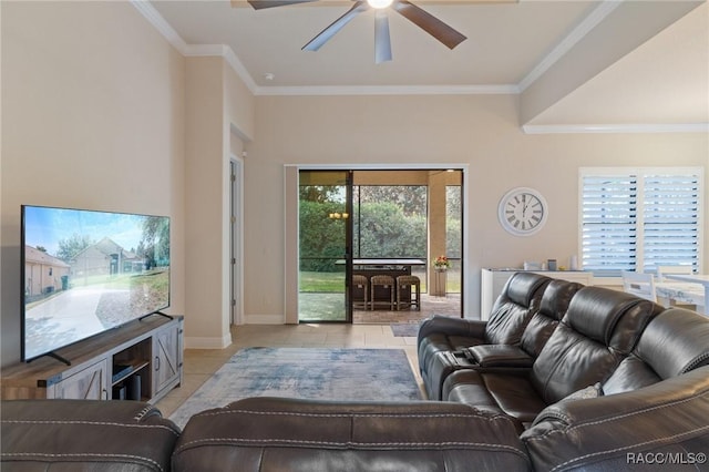 tiled living room featuring ornamental molding, plenty of natural light, and ceiling fan