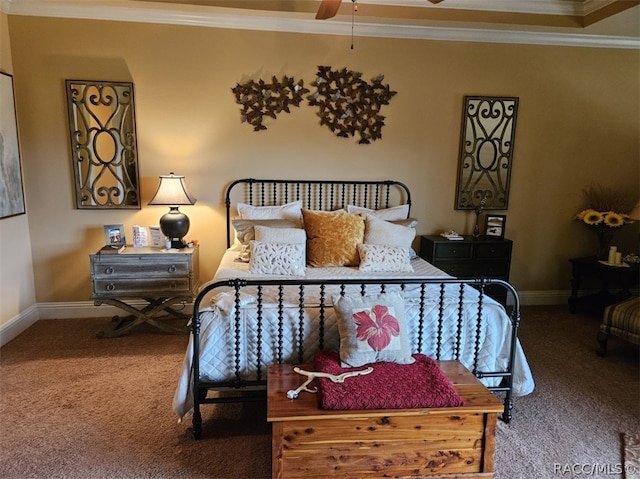 carpeted bedroom with ceiling fan and ornamental molding