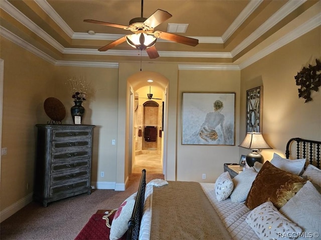 1103 W Pointe Vista Path Unit A4, Hernando, FL 34442 - carpeted bedroom featuring a tray ceiling, arched walkways, crown molding, and a ceiling fan