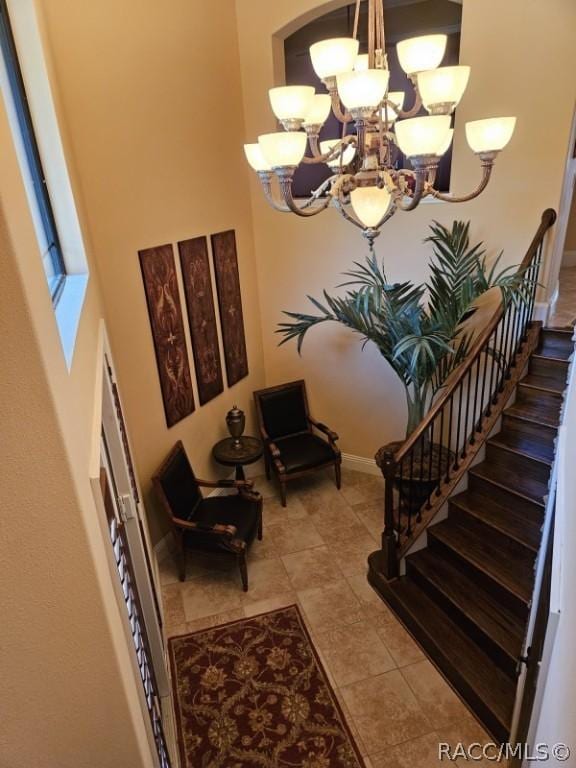 1103 W Pointe Vista Path Unit A4, Hernando, FL 34442 - entryway with a chandelier and stairway