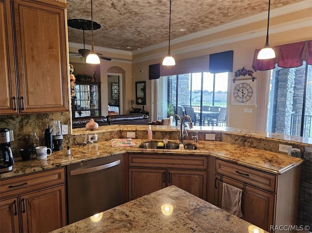 1103 W Pointe Vista Path Unit A4, Hernando, FL 34442 - kitchen with dishwasher, healthy amount of natural light, crown molding, brown cabinets, and light stone counters