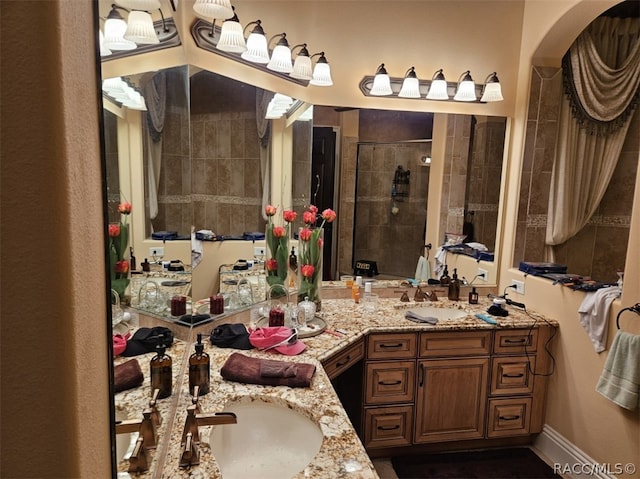 bathroom featuring vanity and walk in shower