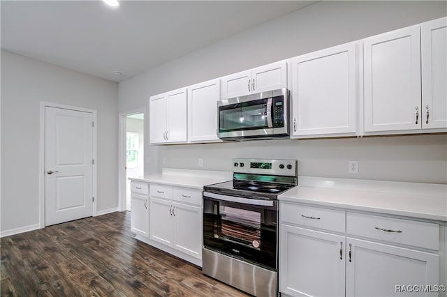 kitchen with white cabinetry, dark wood-type flooring, and appliances with stainless steel finishes