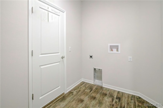 clothes washing area with washer hookup, electric dryer hookup, and hardwood / wood-style flooring