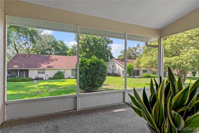 3621 N Lucille Dr, Beverly Hills, FL 34465 - unfurnished sunroom with a residential view and lofted ceiling