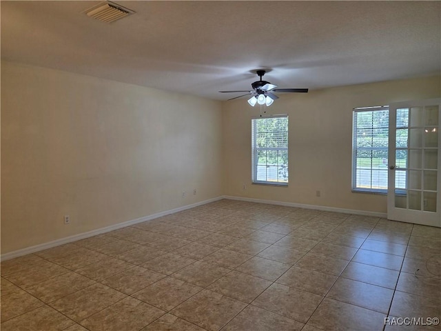 933 N Rembrandt Way, Inverness, FL 34453 - unfurnished room featuring tile patterned floors and a ceiling fan