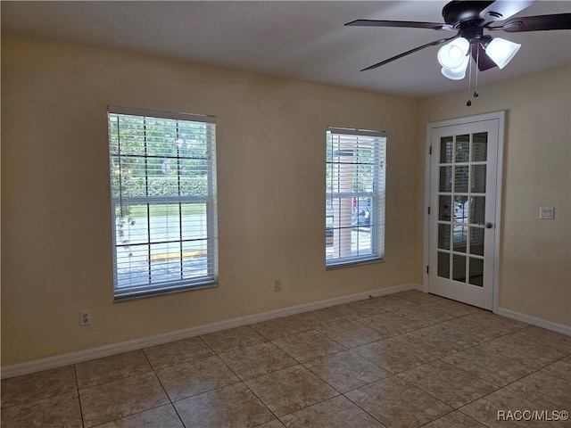 933 N Rembrandt Way, Inverness, FL 34453 - tiled empty room with a ceiling fan and baseboards