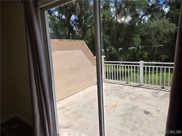 933 N Rembrandt Way, Inverness, FL 34453 - doorway to outside with concrete flooring