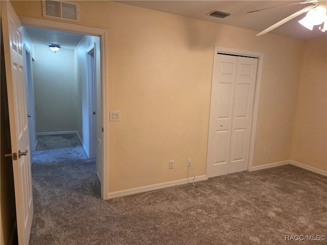 933 N Rembrandt Way, Inverness, FL 34453 - empty room with carpet floors and a ceiling fan