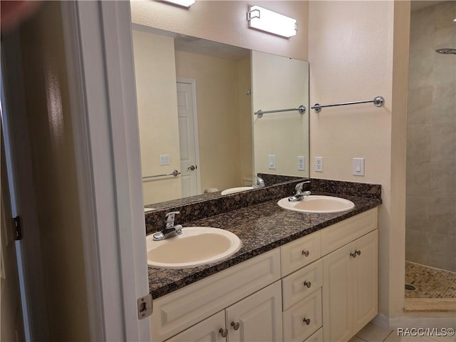 933 N Rembrandt Way, Inverness, FL 34453 - bathroom featuring double vanity and tiled shower