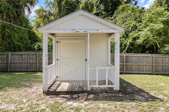 view of outdoor structure featuring a yard