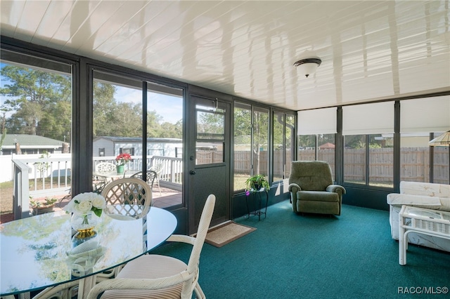 sunroom / solarium featuring a wealth of natural light